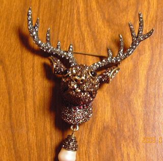 HEIDI DAUS Rudy Crystal Accented Reindeer Pin