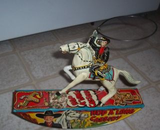  CASSIDY TIN WIND UP ROCKING HORSE LASSO TOY BY MARX RARE VINTAGE