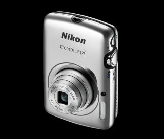 Nikon COOLPIX S01 10.1 MP Digital Camera Silver + leather black case