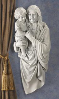 Smiling Jesus Holding Young Child Wall Sculpture