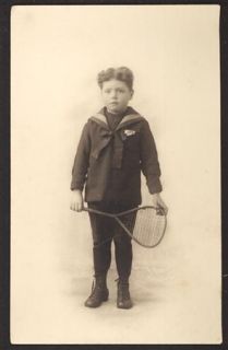 Joung boy with tennis racket antique real cabinet photo  