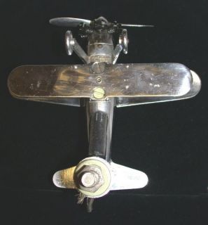 Old Automobile Metal Hood Ornament Biplane Air Plane Propellers Spin