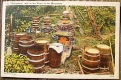 Vintage Moonshine Still in The Mountains Postcard 68098