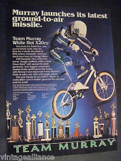 80s image of Murray BMX X20 Freestyle Bicycle w/ trophy display 1984