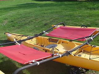 Bimini top for sit on top kayak with fishing rod holders attached