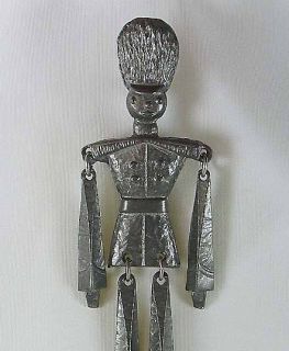Polcini Style articulated Christmas nutcracker toy soldier brooch pin