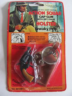 Squad Cap Gun w/Keychain Holster   Sneaky Pete On Card (Die Cast