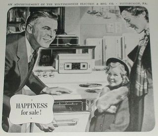 1938 Westinghouse ad, Electric stove with central clock