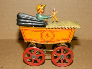  German Meier Tin Litho Penny Toy Baby w Doll in Stroller Wheels Roll