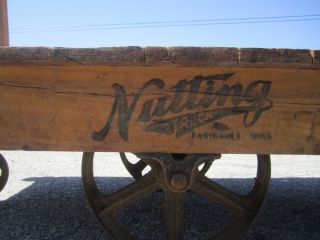 Nutting Wood Hand Cart Coffee Table with Antique Iron Wheels