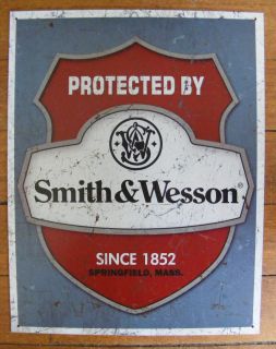 and Wesson Firearms Badge Shield Tin Sign Pistol Gun 38 357 44 Magnum