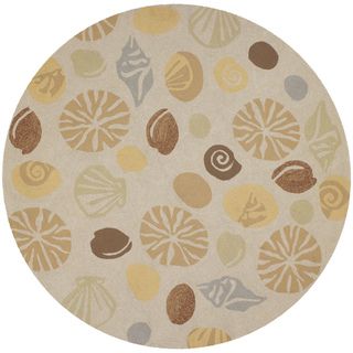 Outdoor Escape Barnegat Bay/ Sand Rug (710 Round) (SandSecondary colors Driftwood, Mocha, Pale Gold, Seagrass, Silver AspenPattern Seashells MotifTip We recommend the use of a non skid pad to keep the rug in place on smooth surfaces.All rug sizes are a